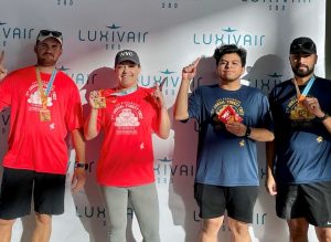 Luxivair SBD staff with finisher medals from the 2021 SB Turkey Trot. Photo courtesy of Bianca Gonzalez, Luxivair SBD