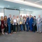 Photo of staff members from IVDA holding EPA Award