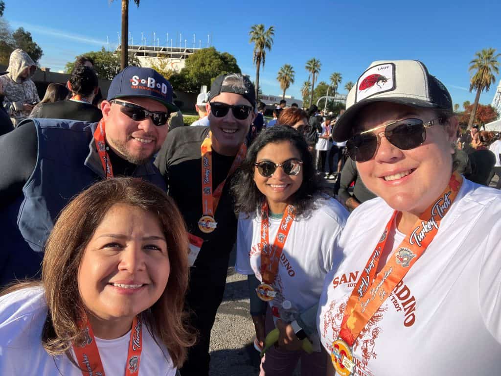 Photo of three women and two men, staff of SBD International Airport, participating in the 10th Annual San Bernardino Turkey Trot